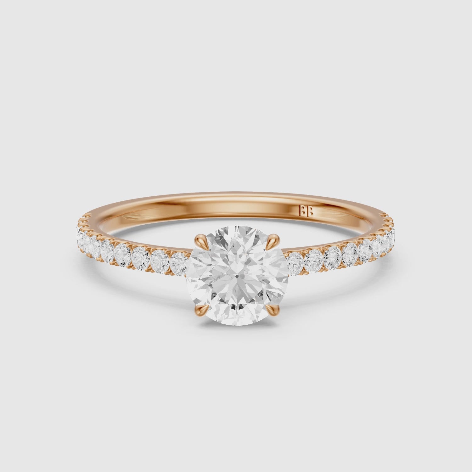 Load video: Tinsly Round Cut Side Stone Pave Moissanite Engagement Ring