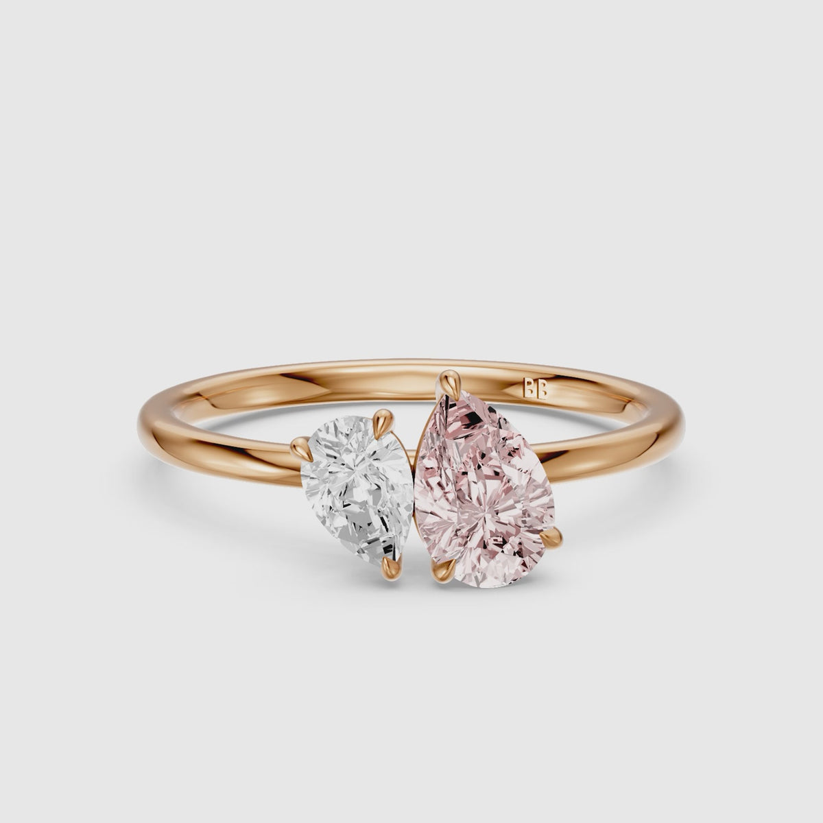 Load video: Kasia Pink and White Graduated Pear Shape Color Lab Grown Diamond Toi et Moi Ring