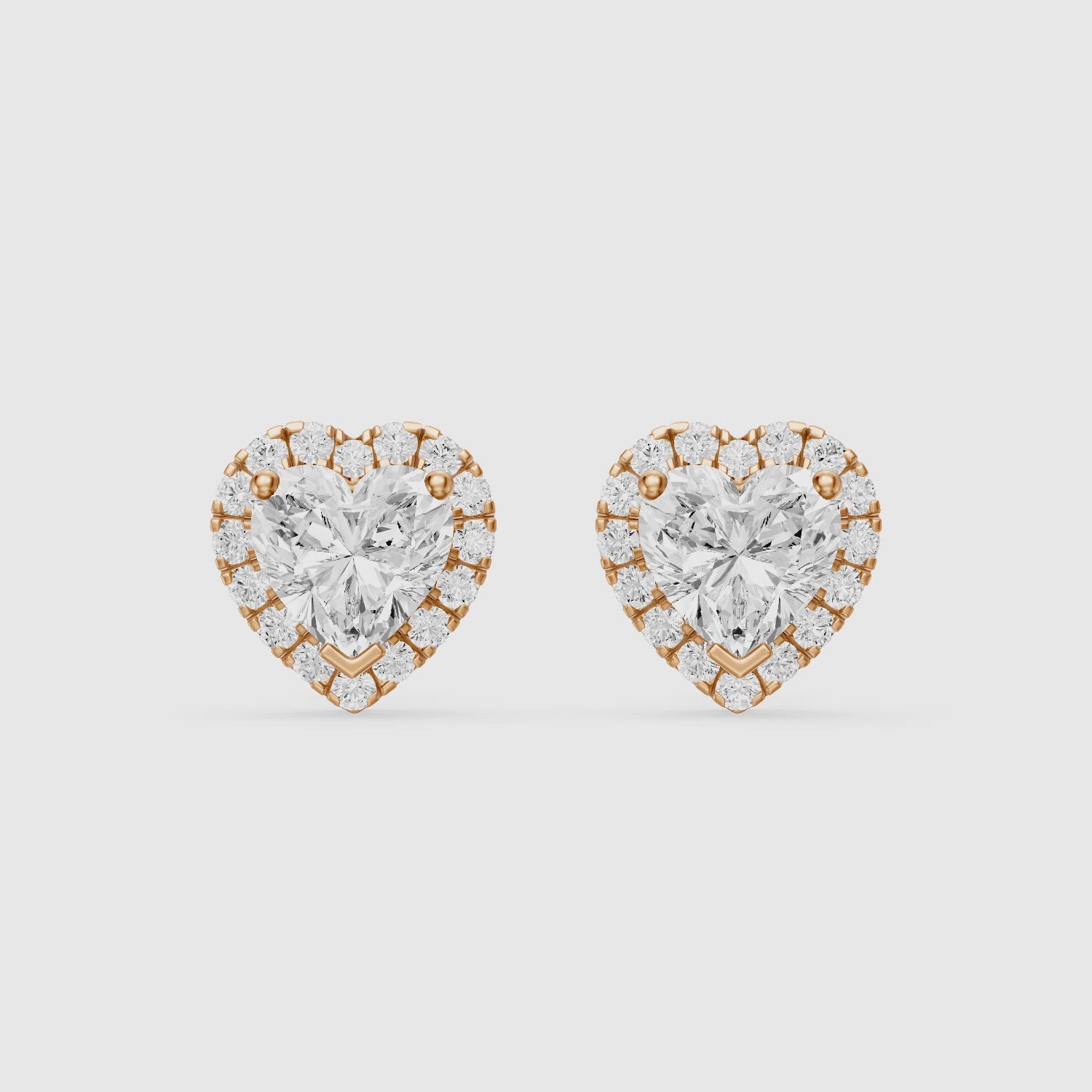 Load video: Zinaida Heart Shape Lab Grown Diamond Halo Stud Earrings