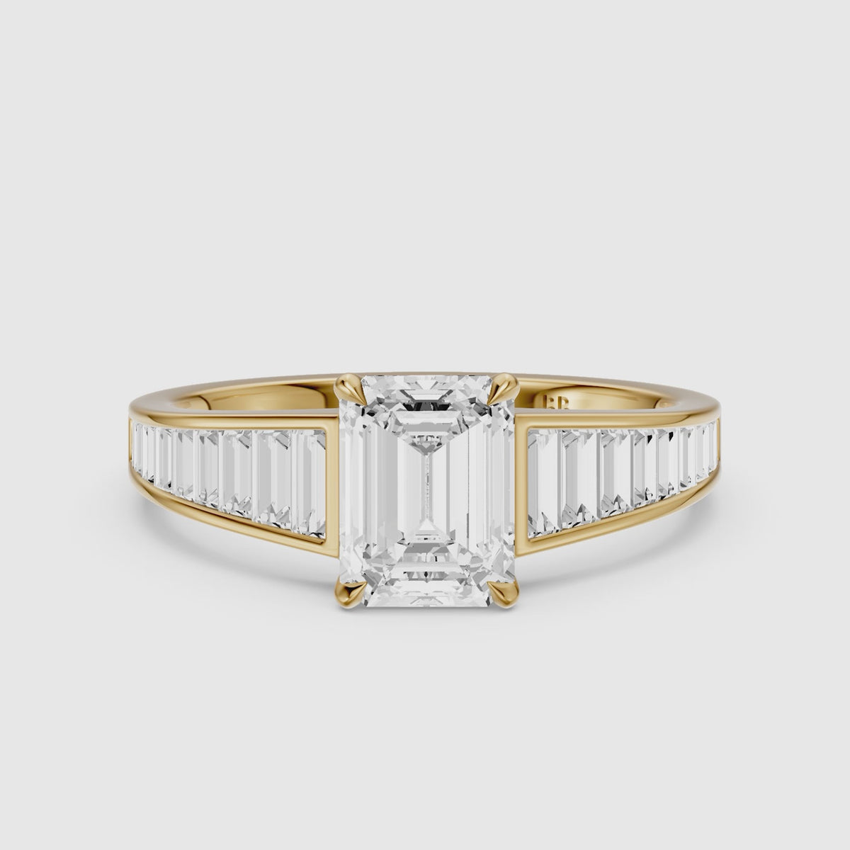 Load video: Angelina Emerald Cut Moissanite Diamond Engagement Ring with Baguette Side Stones