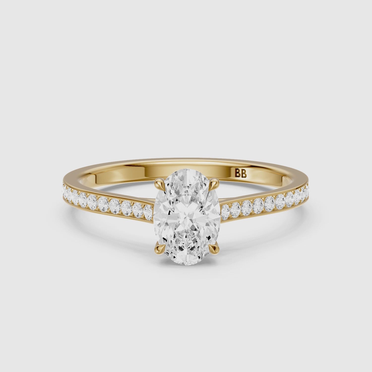 Load video: Ariyah Oval Cut Channel Set Side Stone Moissanite Diamond Ring