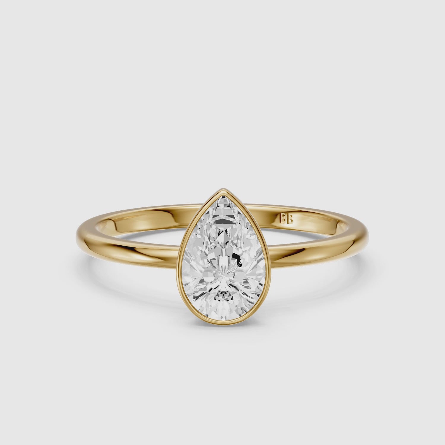 Load video: Kassia Pear Cut Bezel Set Solitaire Lab Grown Diamond Ring