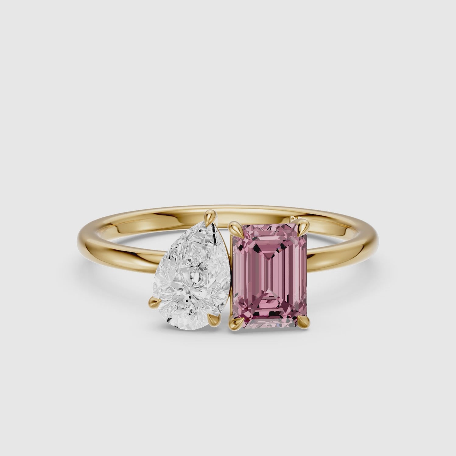 Load video: Kiara Pink Emerald Cut and Pear Shape Color Lab Grown Diamond Toi et Moi Ring