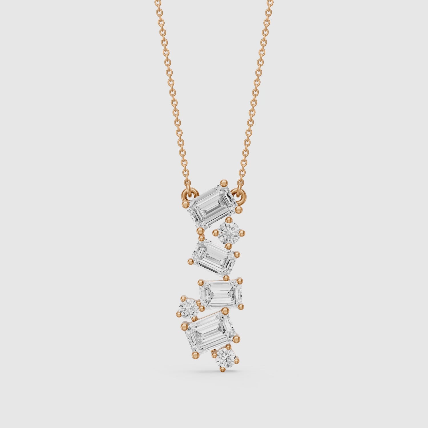 Load video: Paula Emerald Cut and Round Lab Grown Diamond Cascade Pendant