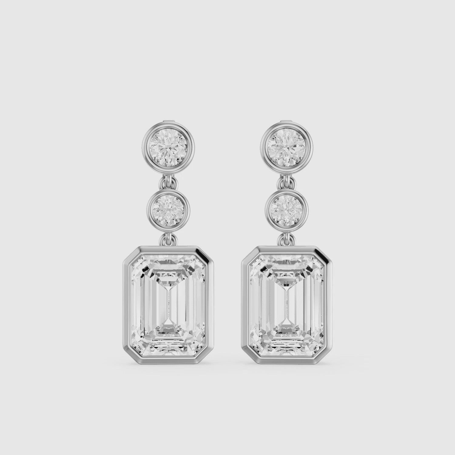 Load video: Bria Round and Emerald Cut Lab Grown Diamond Bezel Drop Earrings