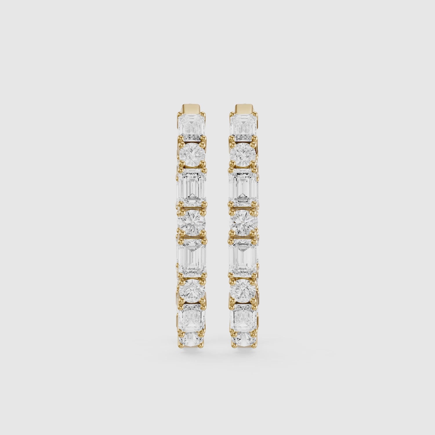 Load video: Kleio Emerald Cut and Round Cut Diamond Inside Out Hoop Earrings