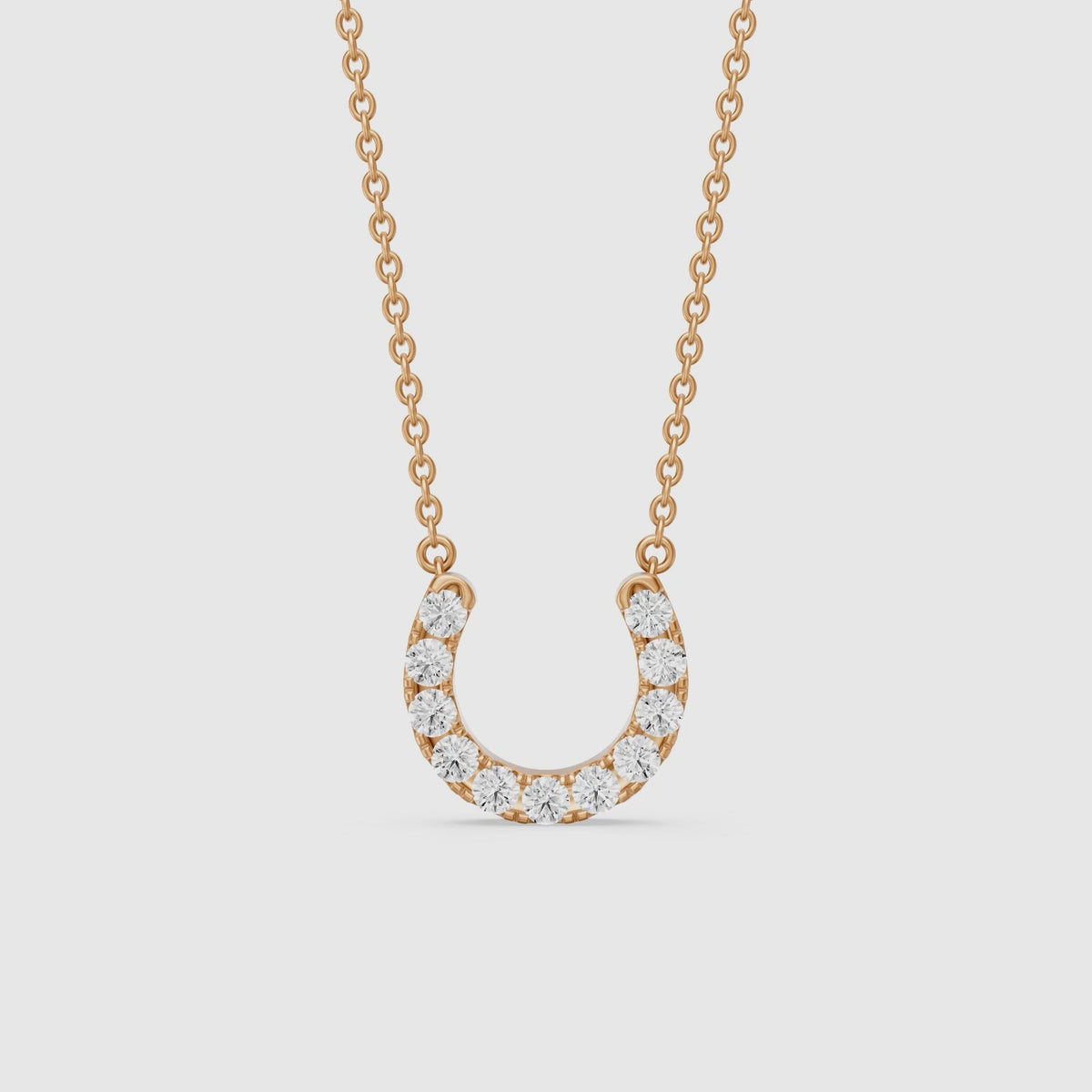 Load video: Amina Round Cut Lab Grown Diamond Horseshoe Pendant