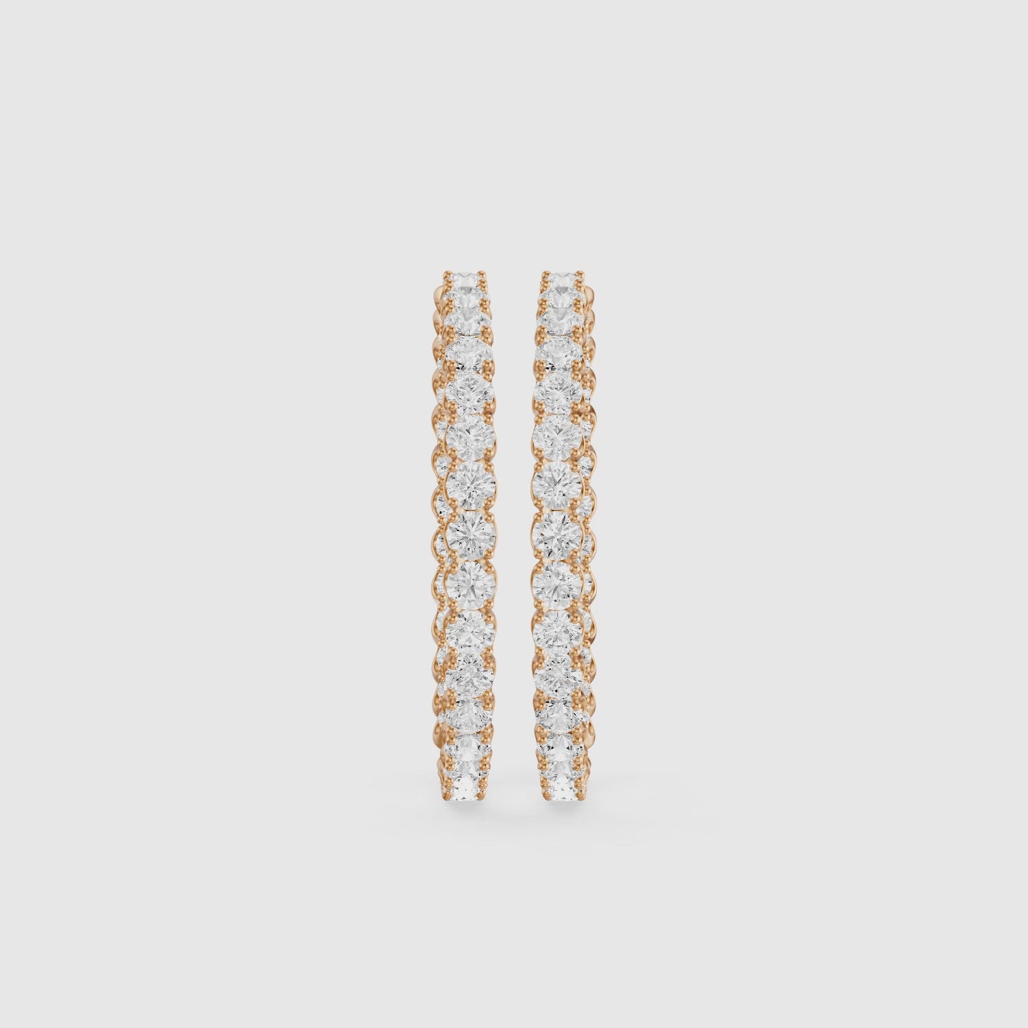 Load video: Solange Four Prong Round Lab Grown Diamond Inside Out Hoop Earrings