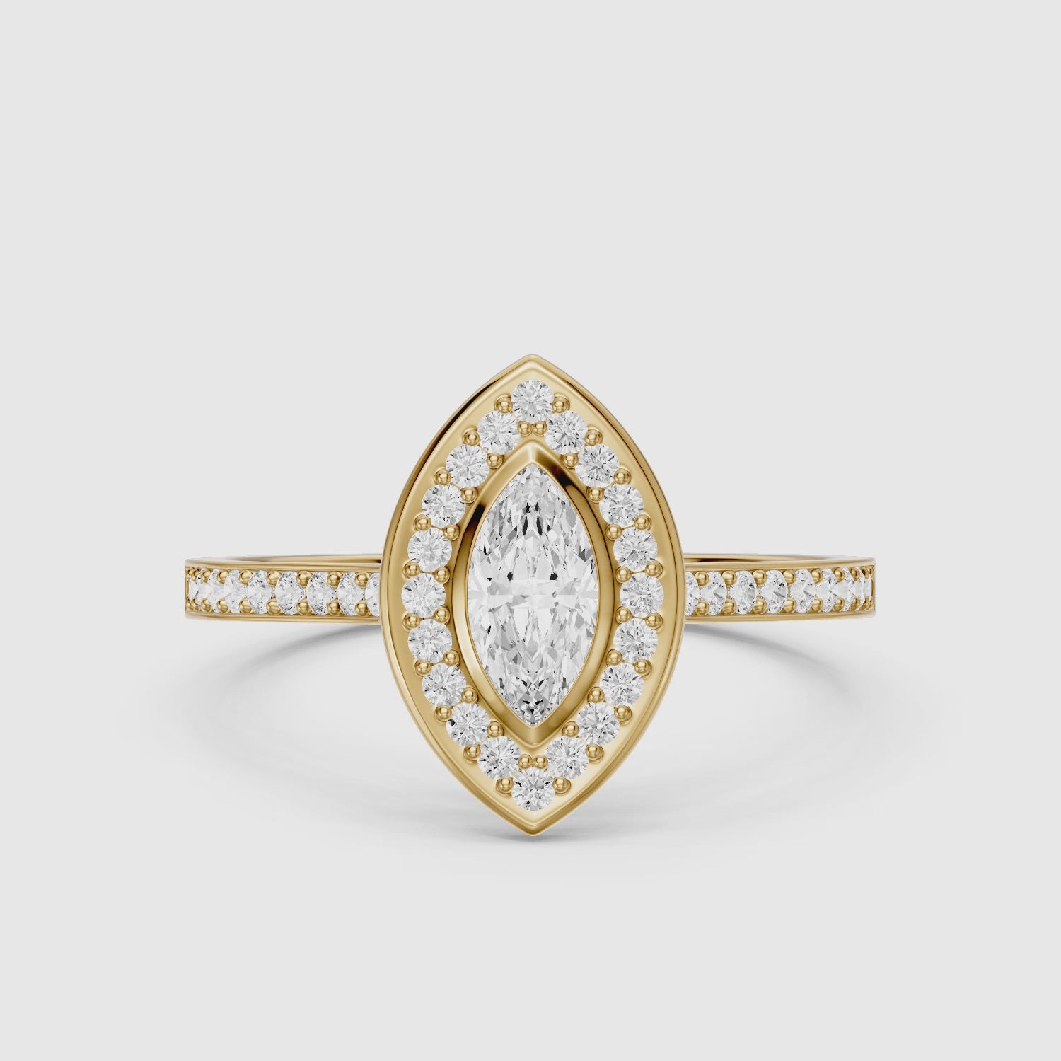 Load video: Celeste Marquise Moissanite Diamond Ring with Bezel Inspired Halo Setting