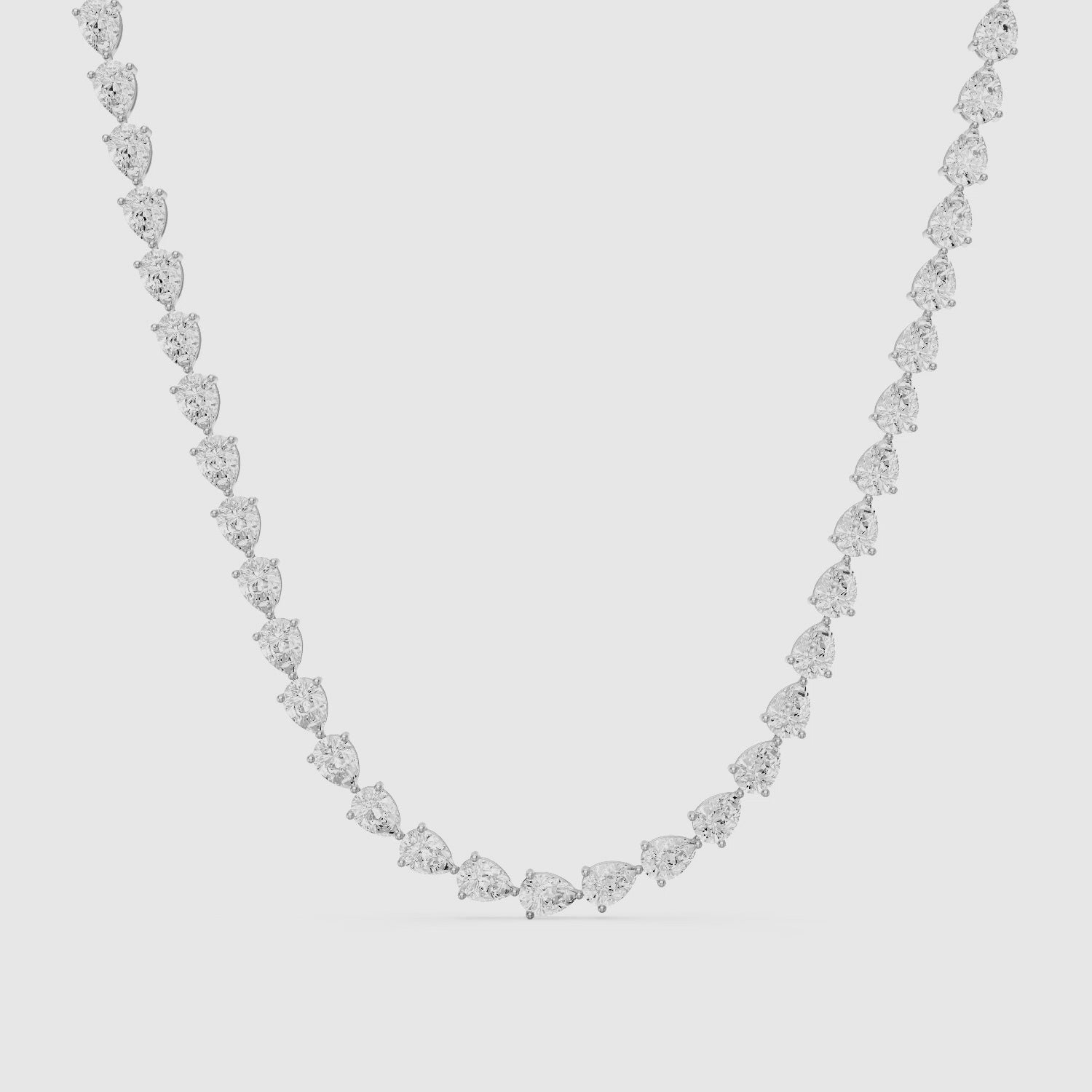 Load video: Beatrice Pear Lab Grown Diamond Three-Prong Tennis Necklace