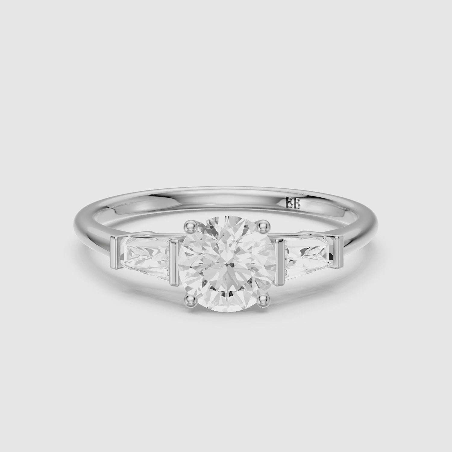 Load video: Kelcie Round 3 Stone Lab Grown Diamond Ring With Baguette Side Stones
