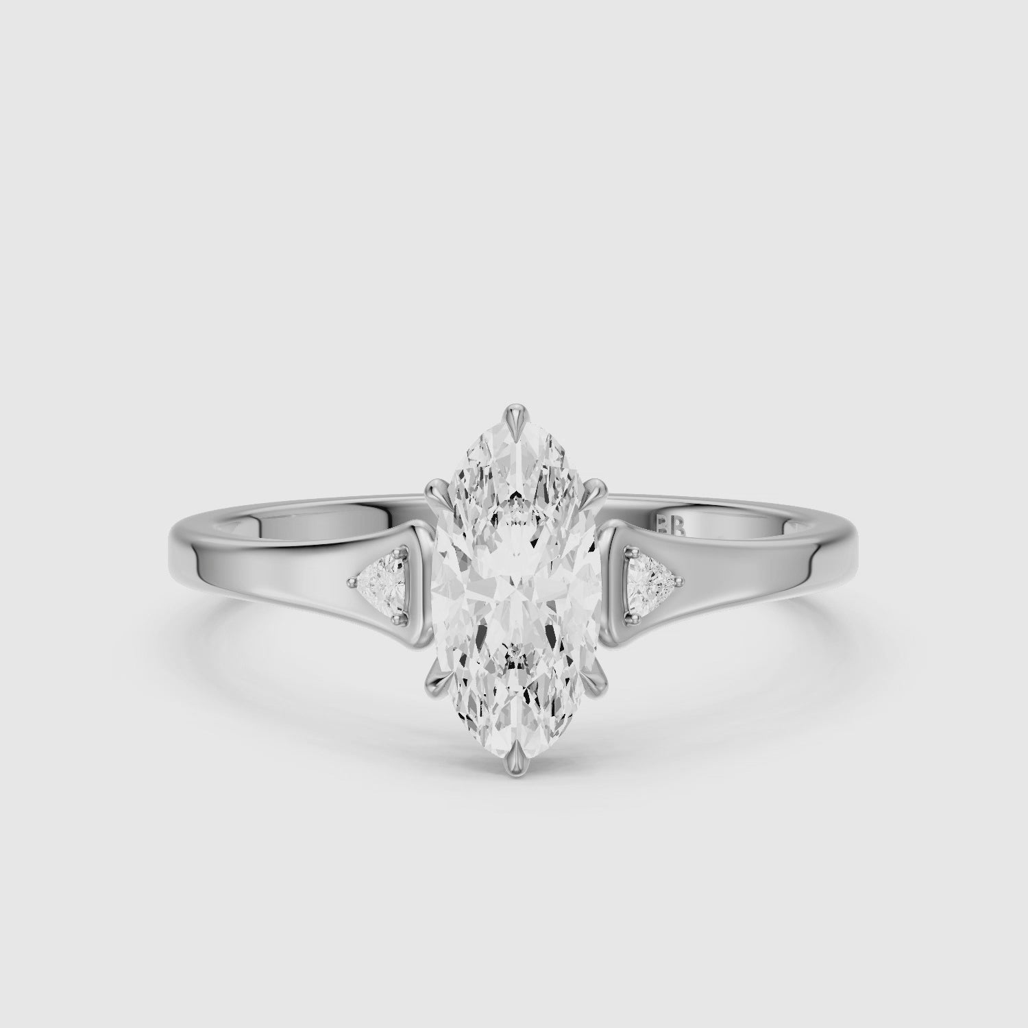 Load video: Eline Moval Cut Moissanite Diamond Three Stone Ring with Trillion Accents