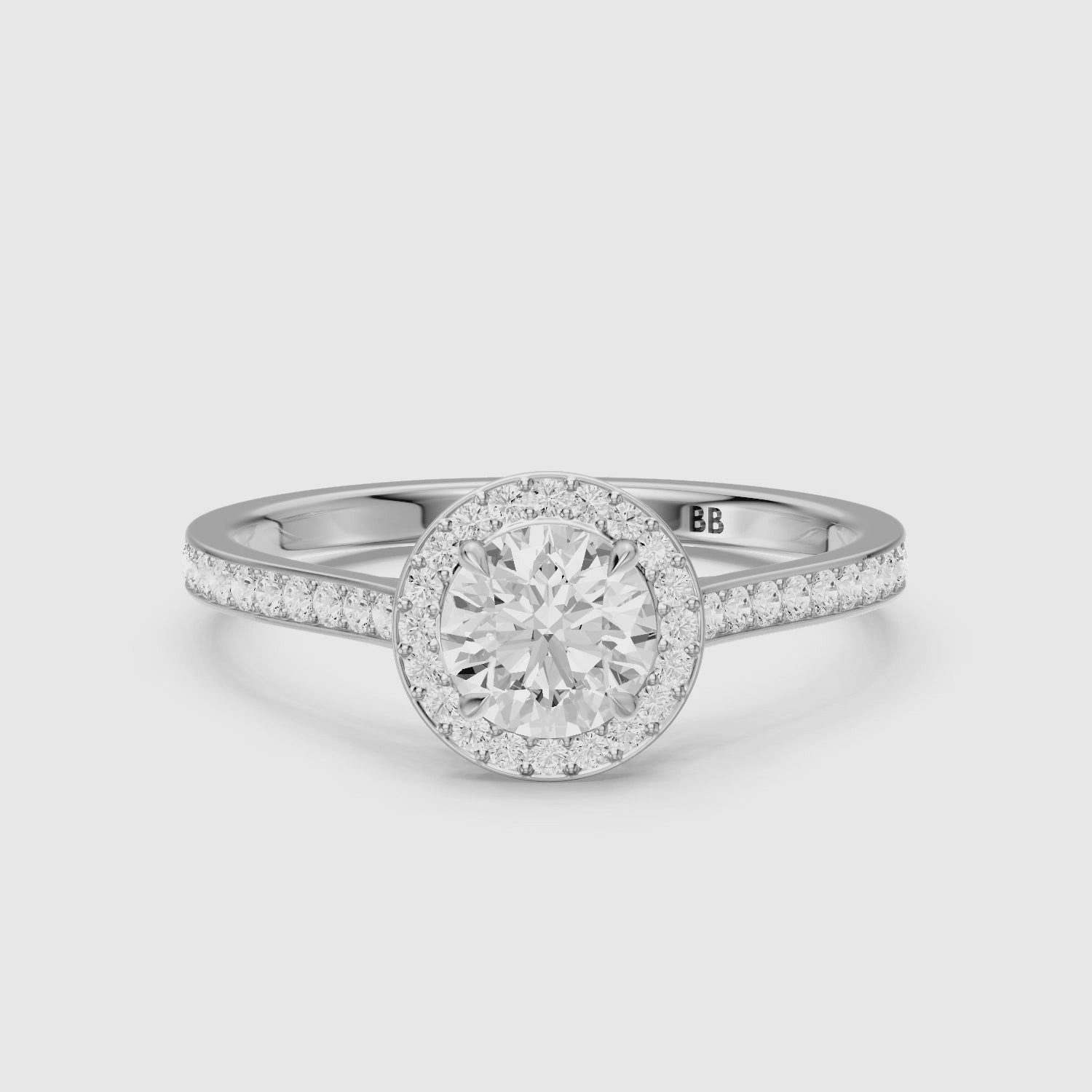 Load video: Marlie Round Cut Halo Channel Set Lab Grown Diamond Ring
