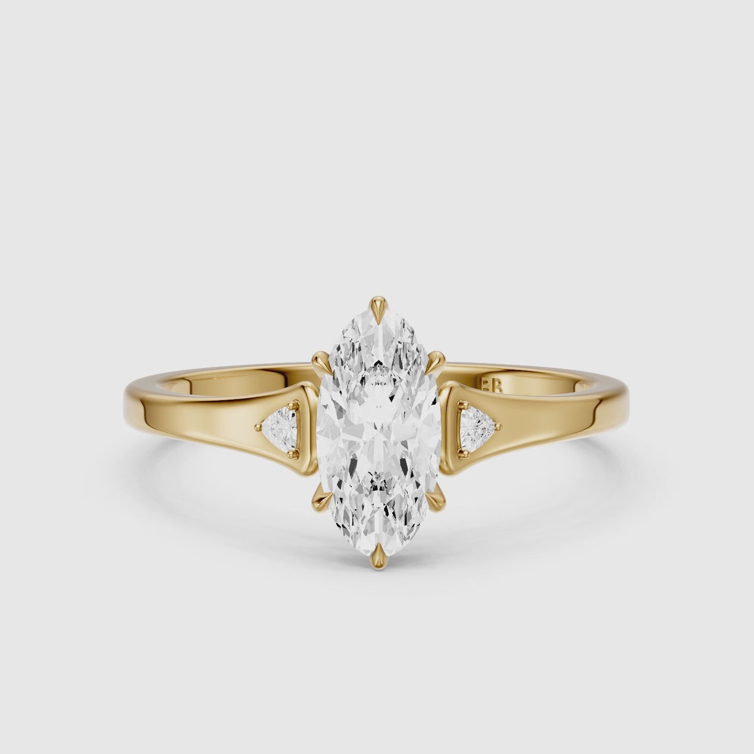 Load video: Eline Moval Cut Moissanite Diamond Three Stone Ring with Trillion Accents