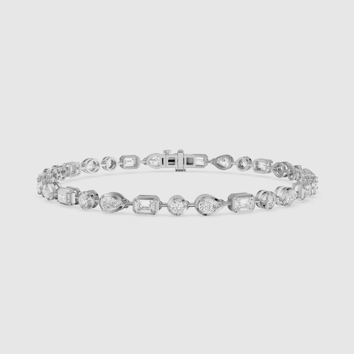 Load video: Ezra Pear, Emerald Cut and Round Lab Grown Diamond Tennis Bracelet