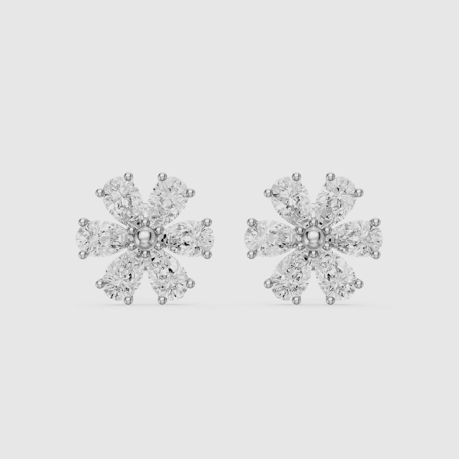 Load video: Oliwia Pear Cut Lab Grown Diamond Floral Cluster Stud Earrings