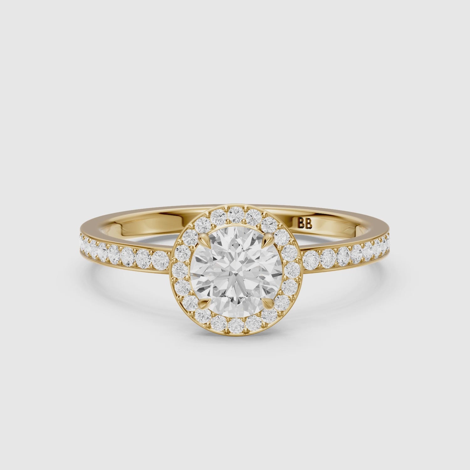 Load video: Jordyn Round Cut Halo Channel Set Lab Grown Diamond Ring
