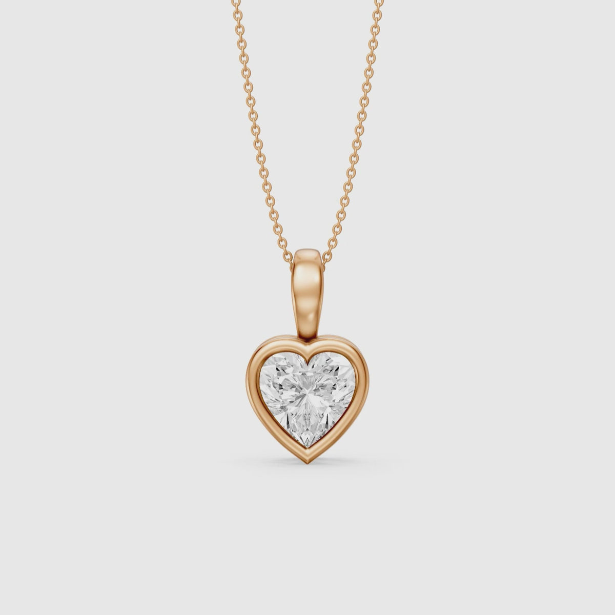Load video: Anne Heart Shape Bezel Set Lab Grown Diamond Solitaire Pendant