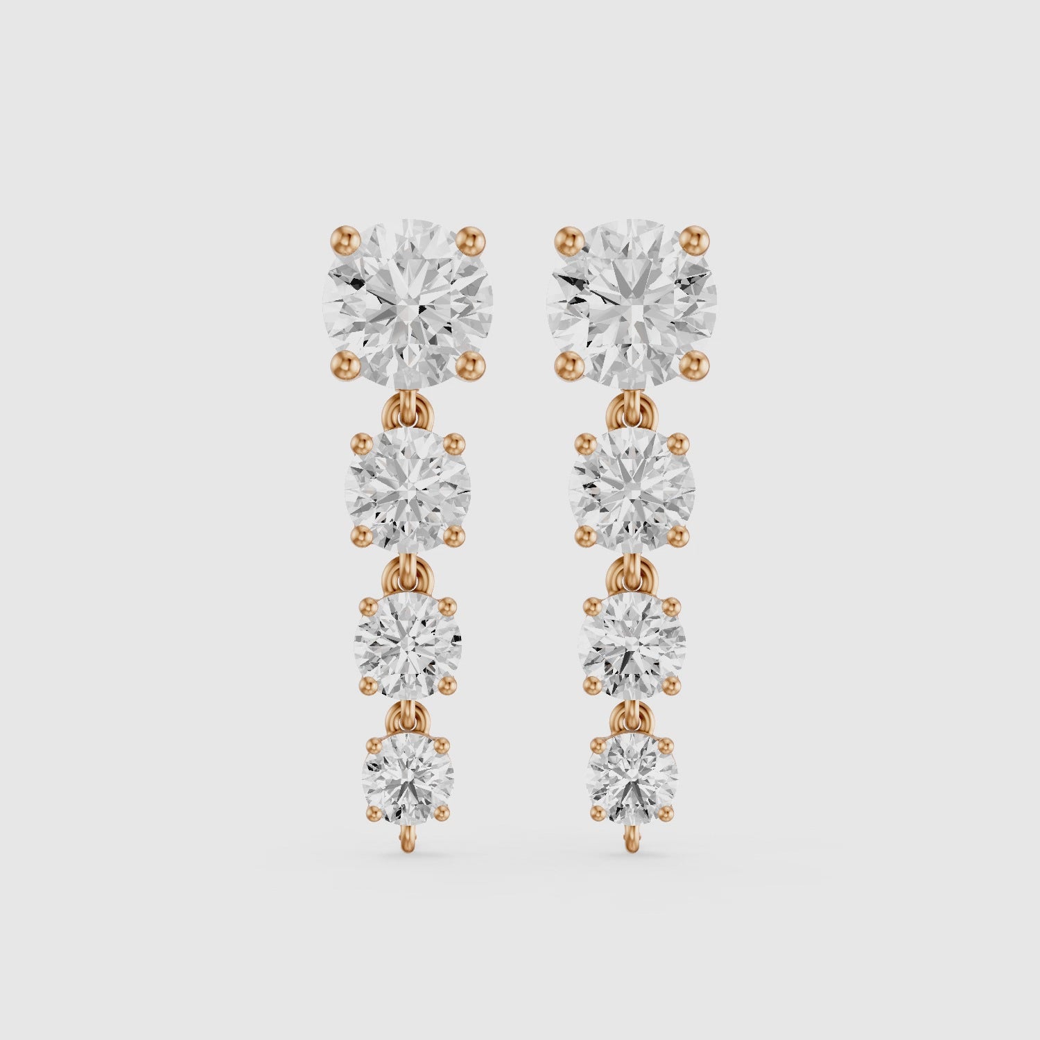 Load video: Lauryn Graduated Round Lab Grown Diamond Linear Earrings