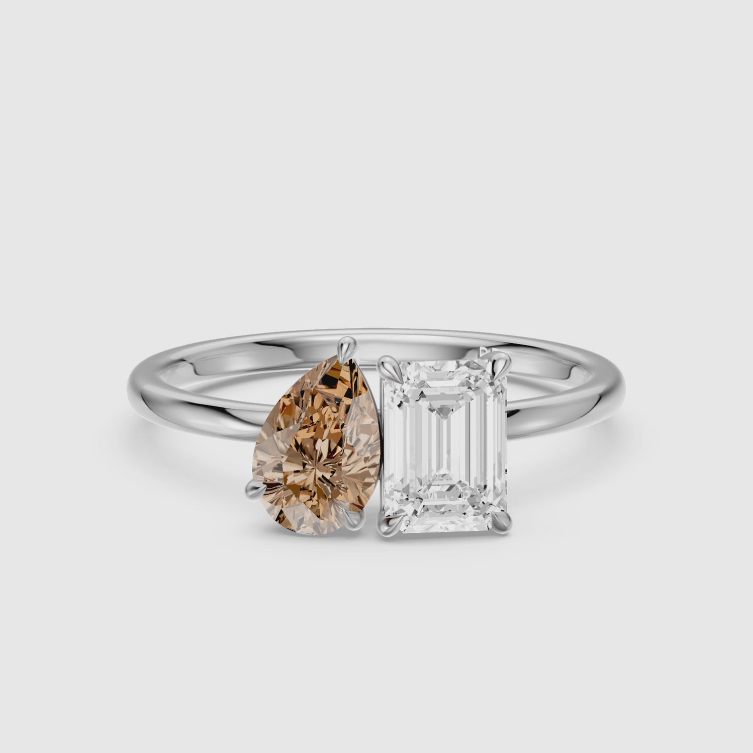 Load video: Elettra Champagne Pear and Emerald Cut Color Lab Grown Diamond Toi et Moi Ring