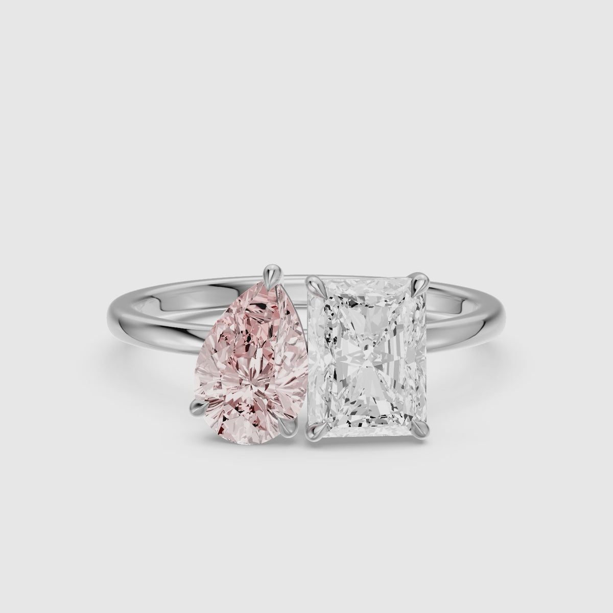 Load video: Zita Pink Pear and Radiant Cut Colored Lab Grown Diamond Toi et Moi Ring