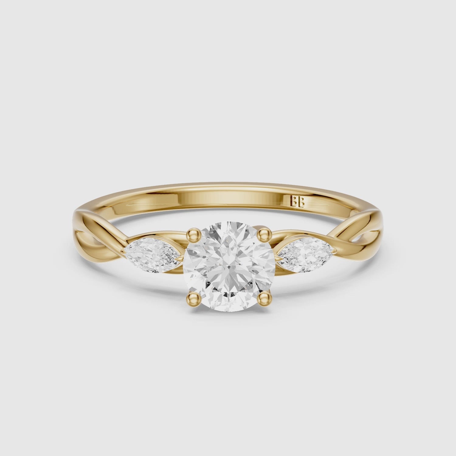 Load video: June Round Cut Side Stone Lab Grown Diamond Ring with Twisted Vine Band