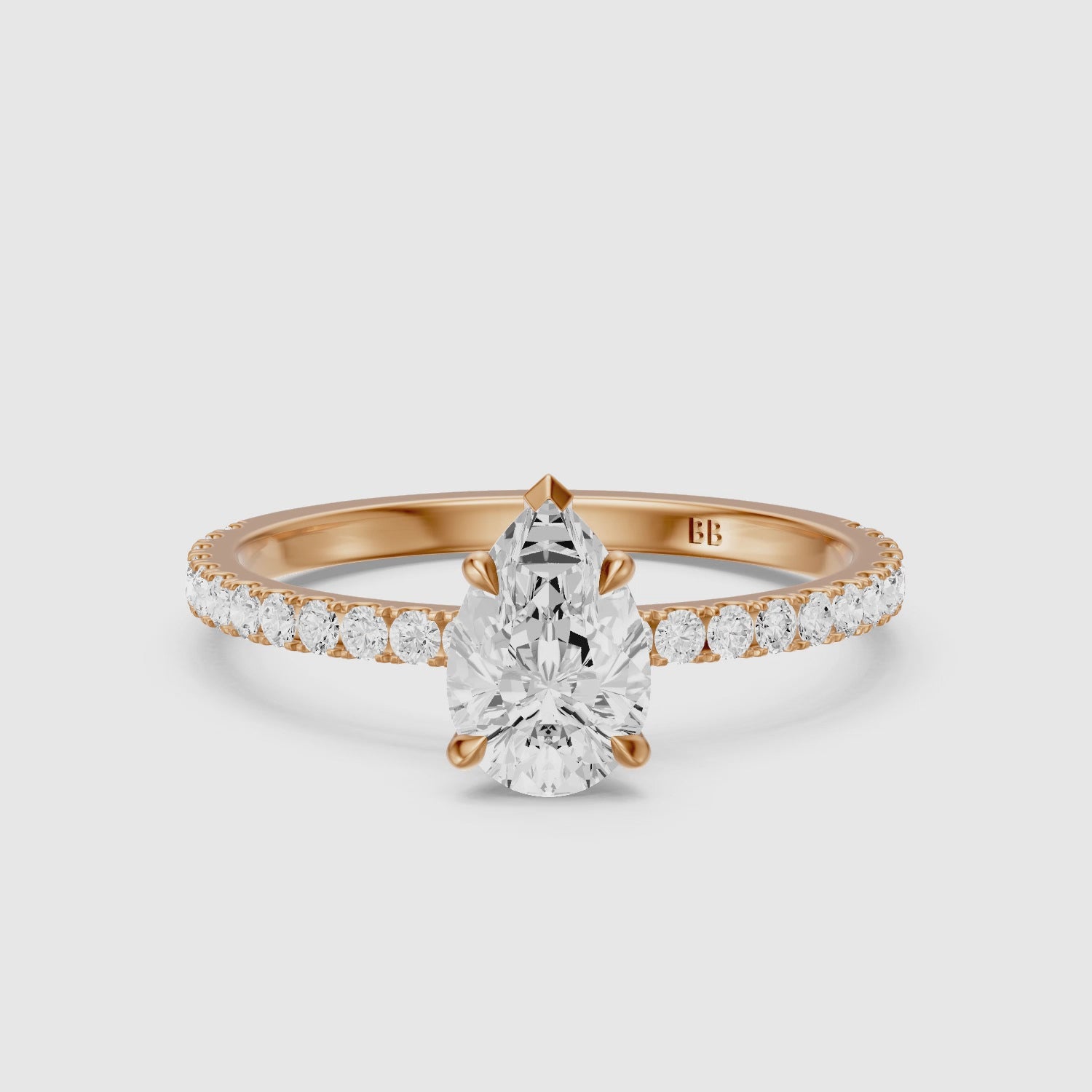 Load video: Kailey 5 Prong Pear Cut Pave Side Stone Moissanite Diamond Ring