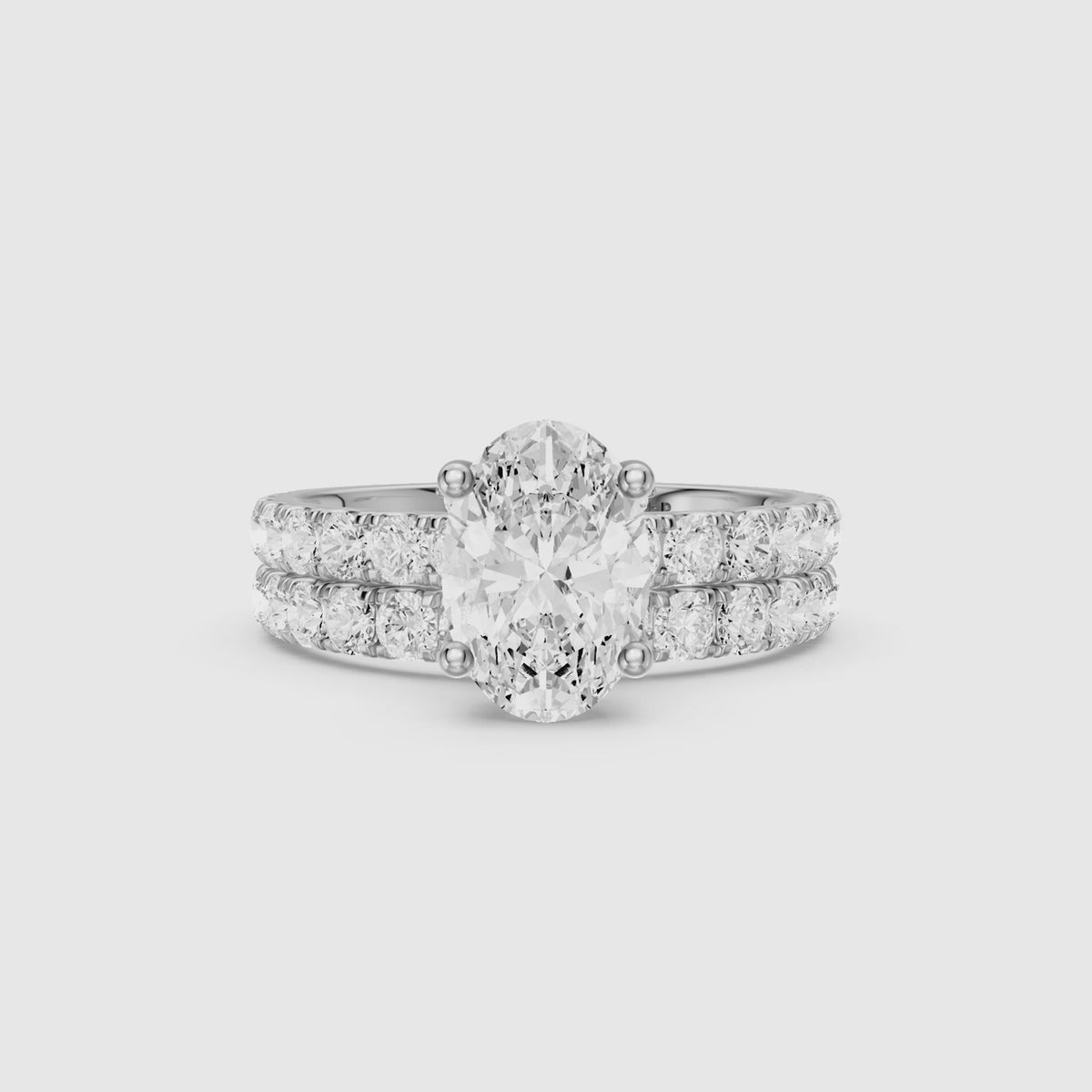 Load video: Luana Oval Cut Lab Grown Diamond Pave Bridal Set with Hidden Halo