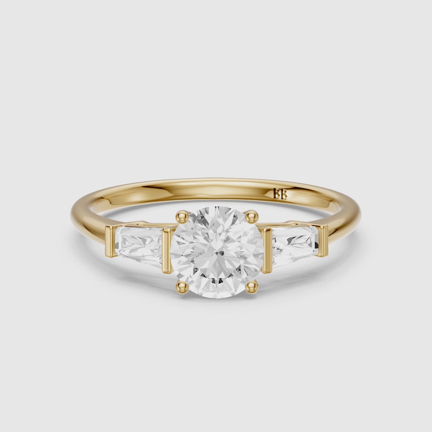 Load video: Kelcie Round 3 Stone Lab Grown Diamond Ring With Baguette Side Stones