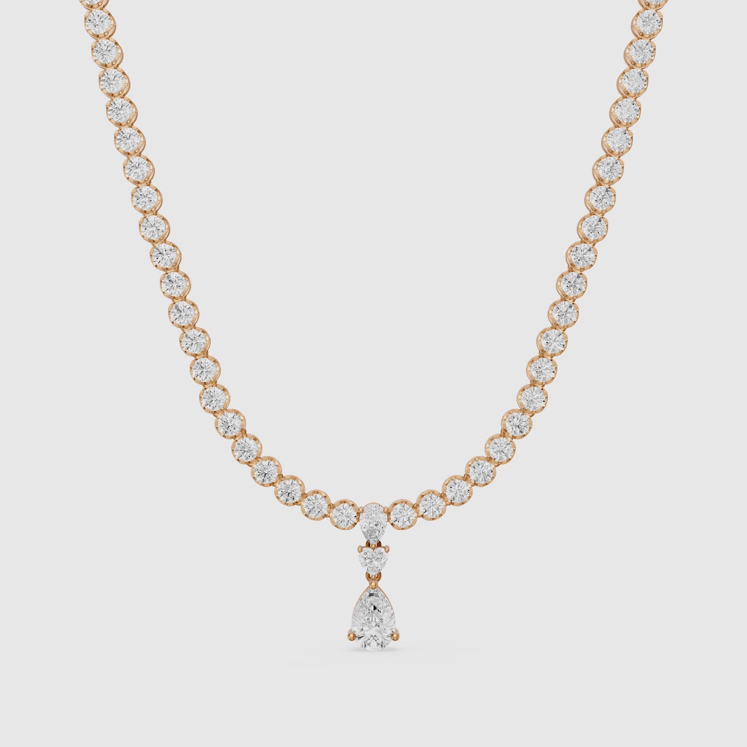 Load video: Raelynn Round Bezel Lab Grown Diamond Pear Drop Tennis Necklace