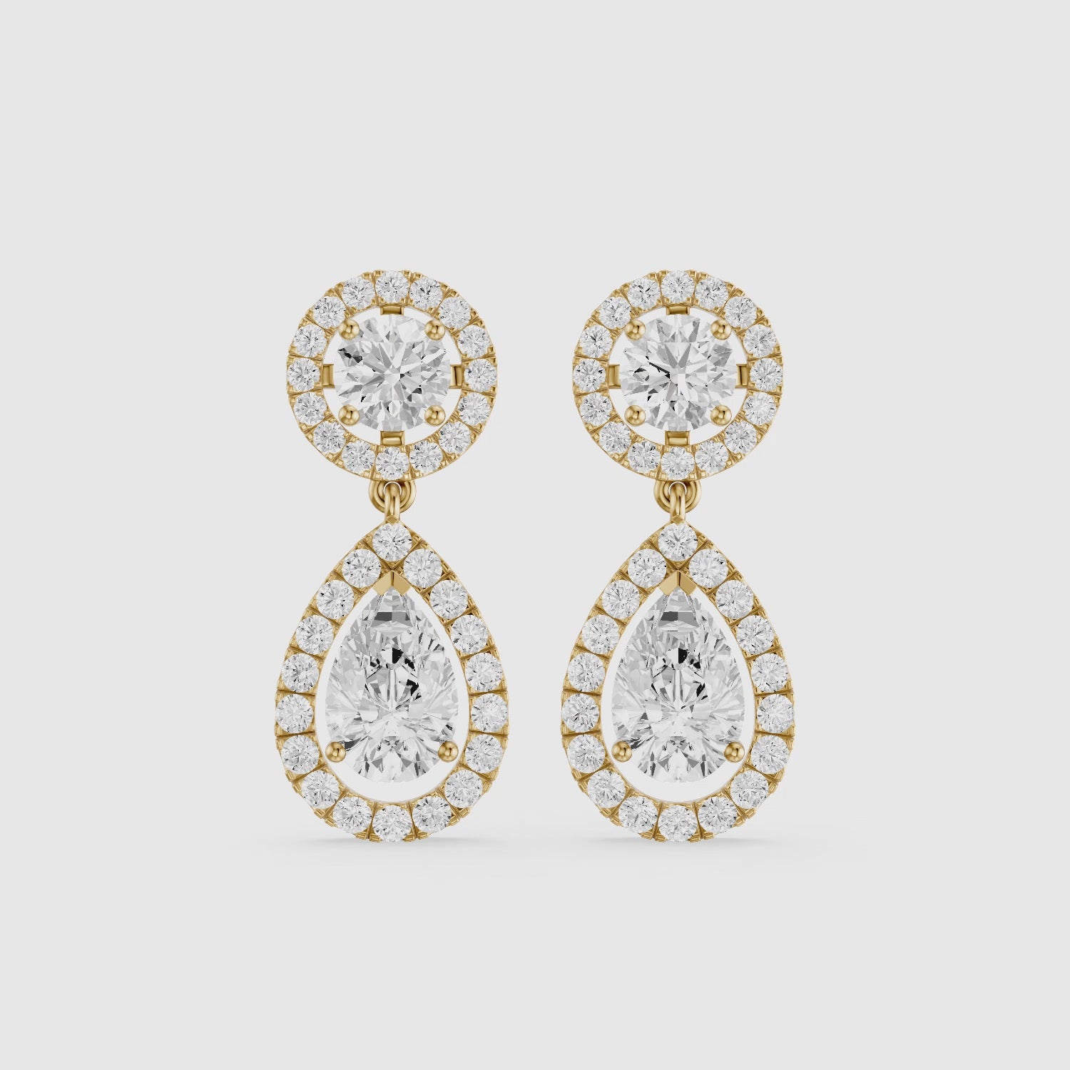 Load video: Echo Round and Pear Shaped Halo Lab Grown Diamond Drop Earrings