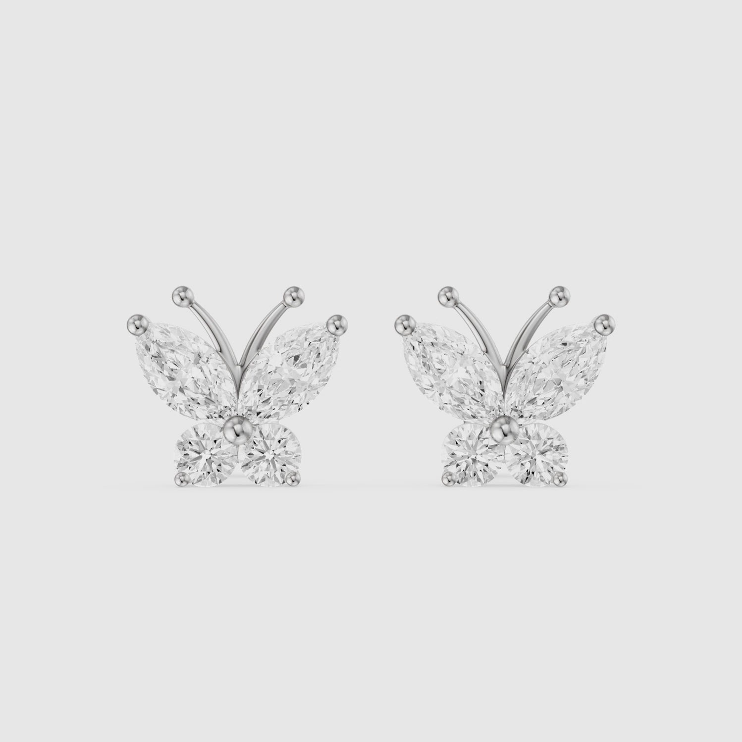Load video: Delphine Marquise and Round Lab Grown Diamond Butterfly Stud Earrings