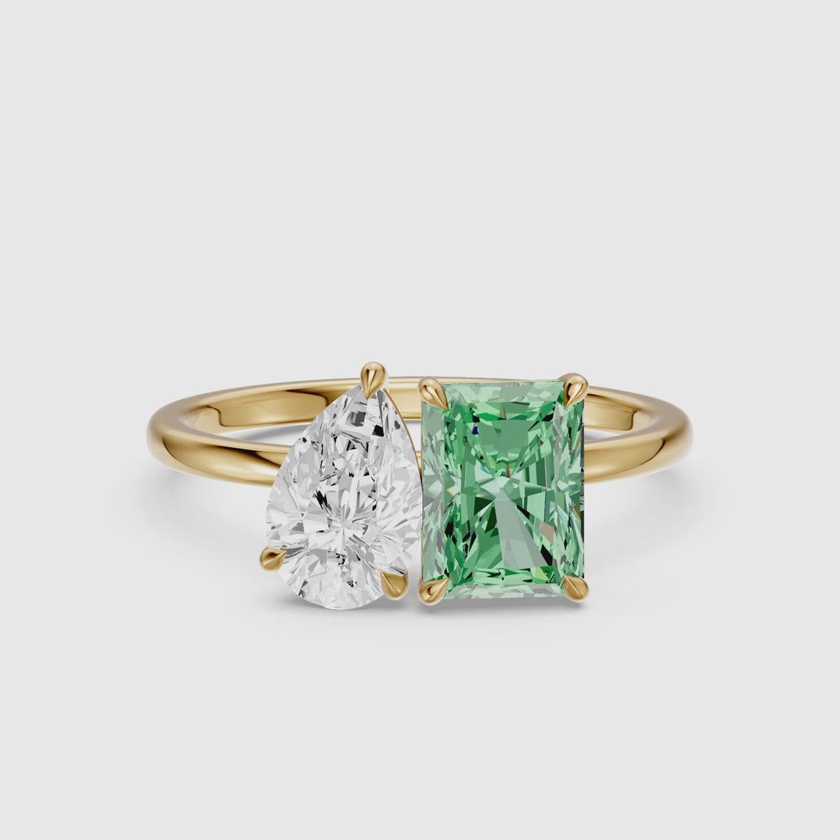 Load video: Cybele Green Radiant and Pear Cut Colored Lab Grown Diamond Toi et Moi Ring