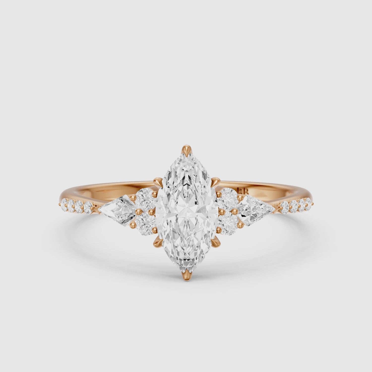 Load video: Charlie Marquise Cut Lab Grown Diamond Ring with Round and Kite Side Stones