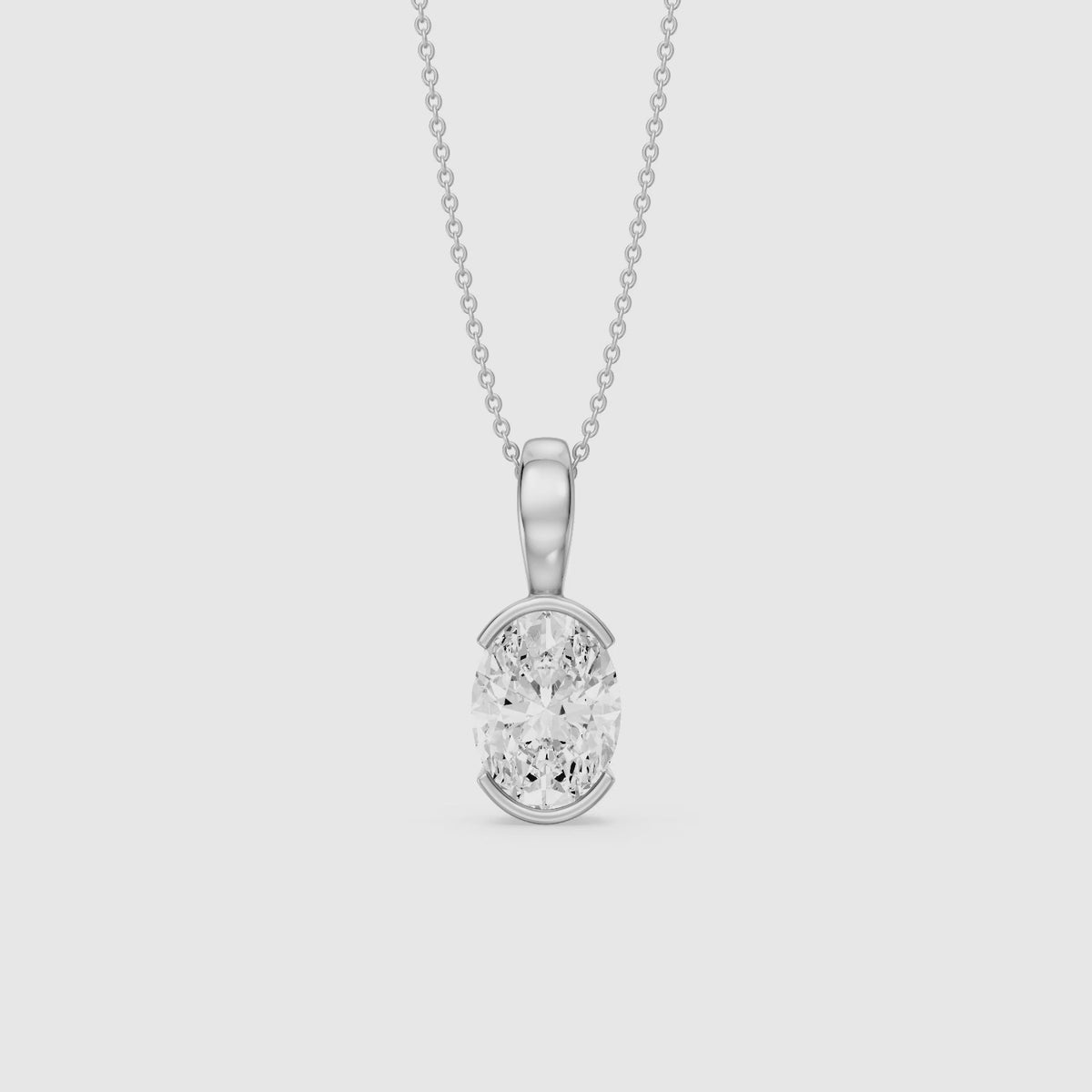 Load video: Matilda Oval Shape Half Bezel Lab Grown Diamond Pendant