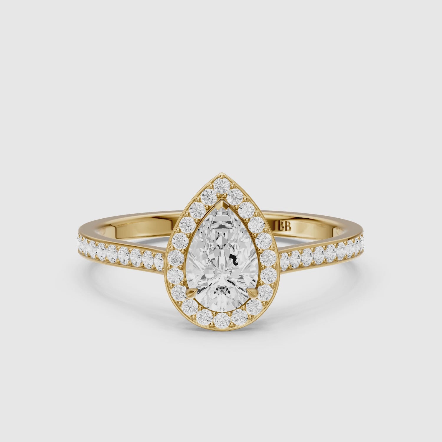 Load video: Darcie Pear Cut Halo Channel Set Lab Grown Diamond Ring