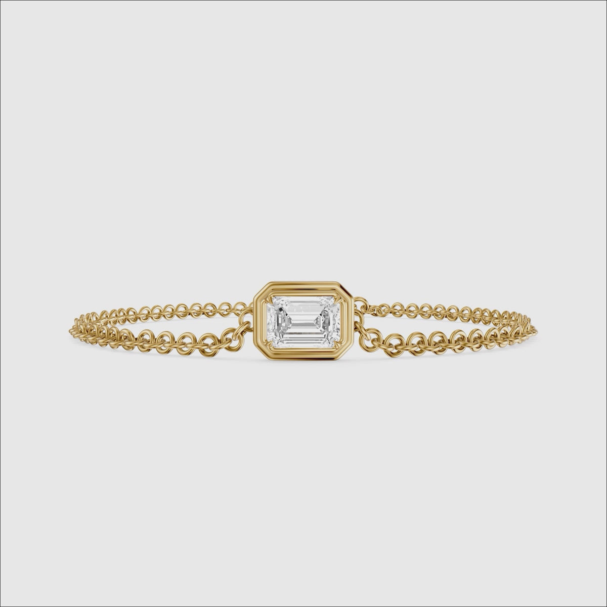 Load video: Keely East West Emerald Cut Lab Grown Diamond Single Stone Bezel Bracelet