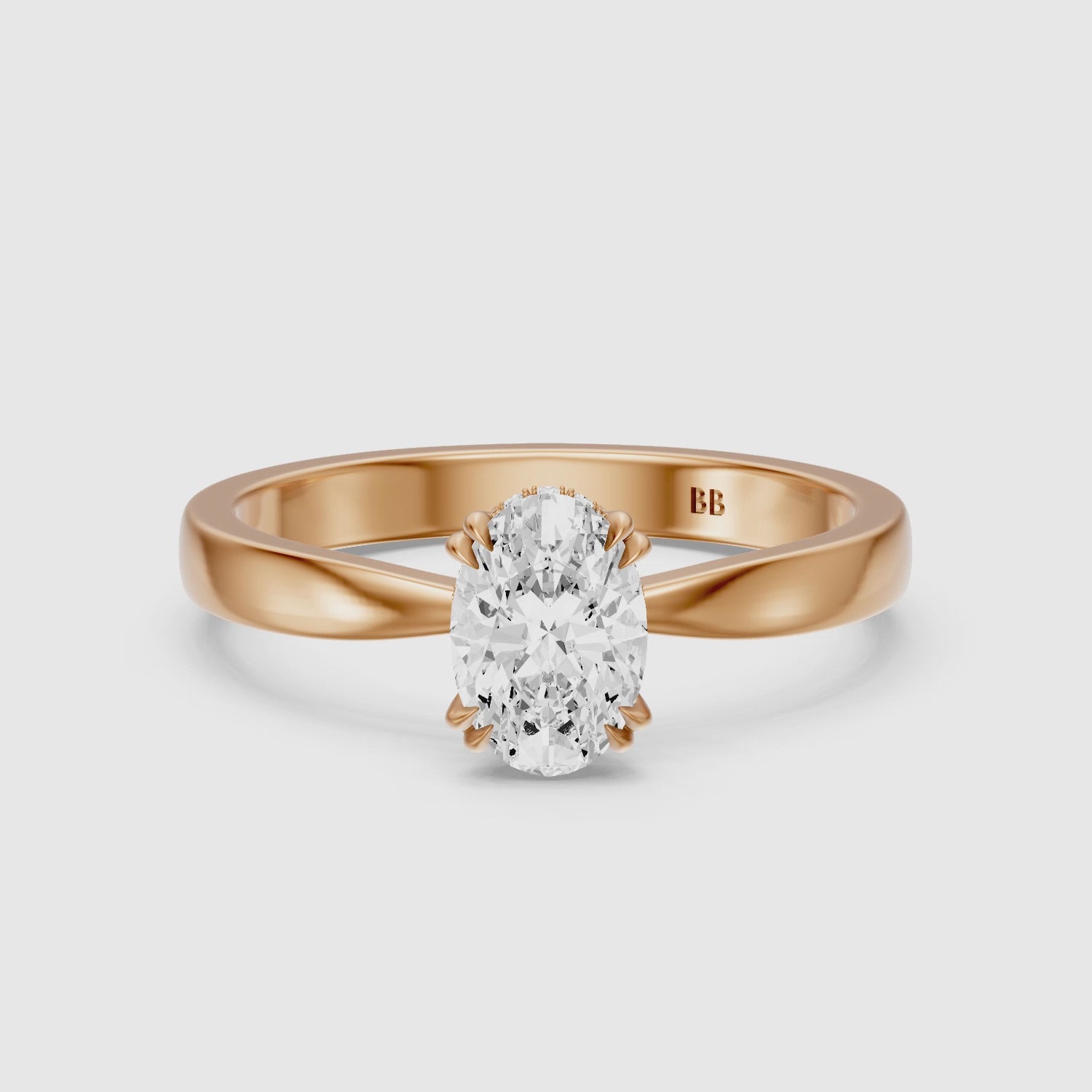 Load video: Jamie Oval Hidden Halo Lab Grown Diamond Ring with Double Claw Prongs