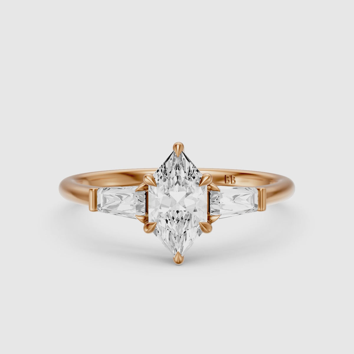 Load video: Dulce Dutch Marquise Lab Grown Diamond Three Stone Ring with Tapered Baguettes
