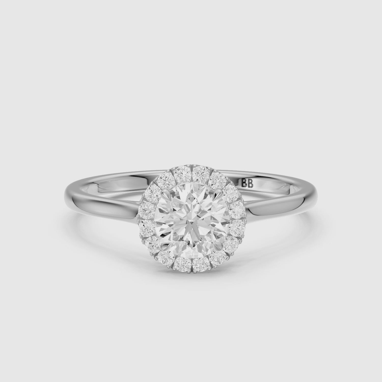 Load video: Karina Round Cut Halo Cathedral Style Moissanite Diamond Ring
