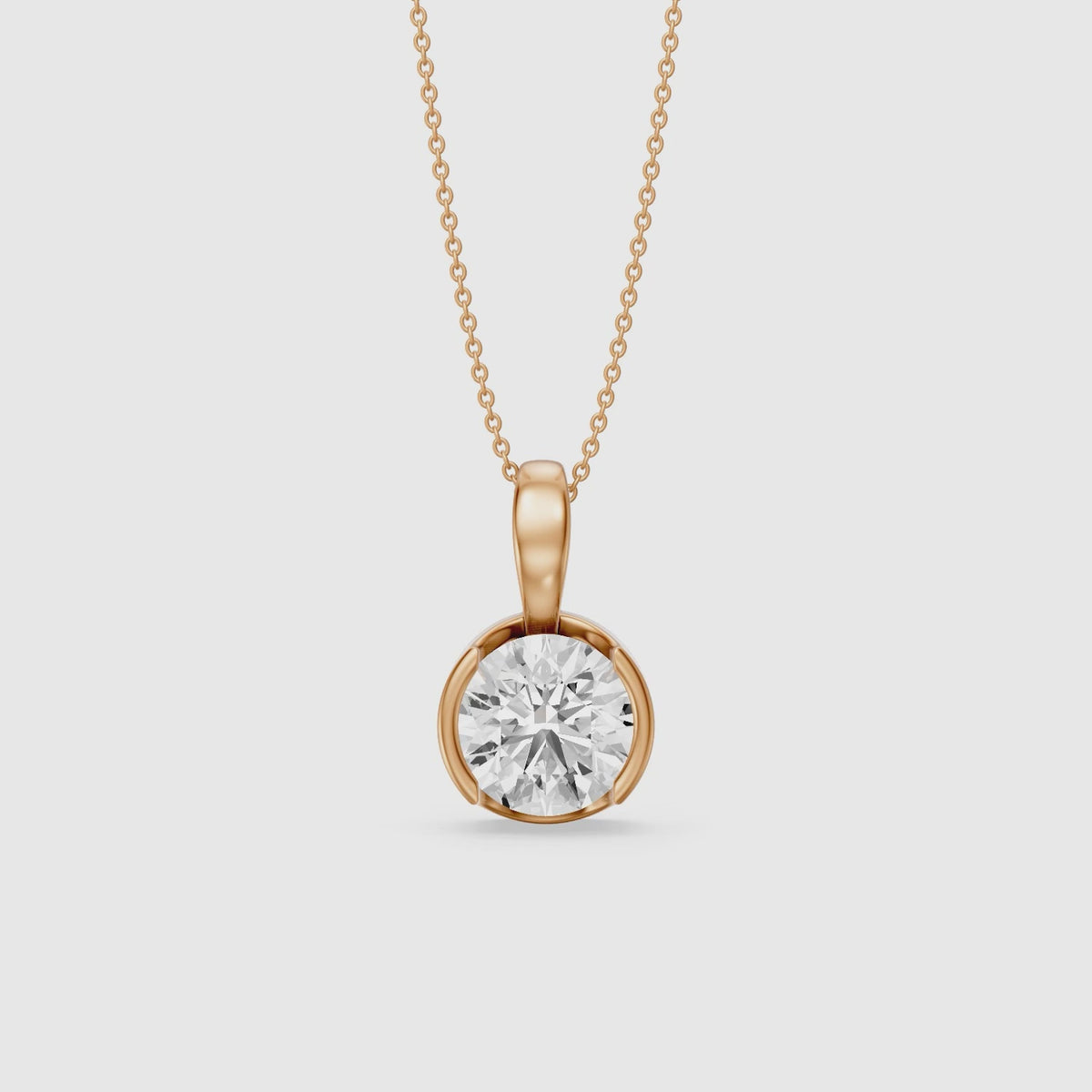 Load video: Morgan Round Lab Grown Diamond Half Bezel Solitaire Pendant