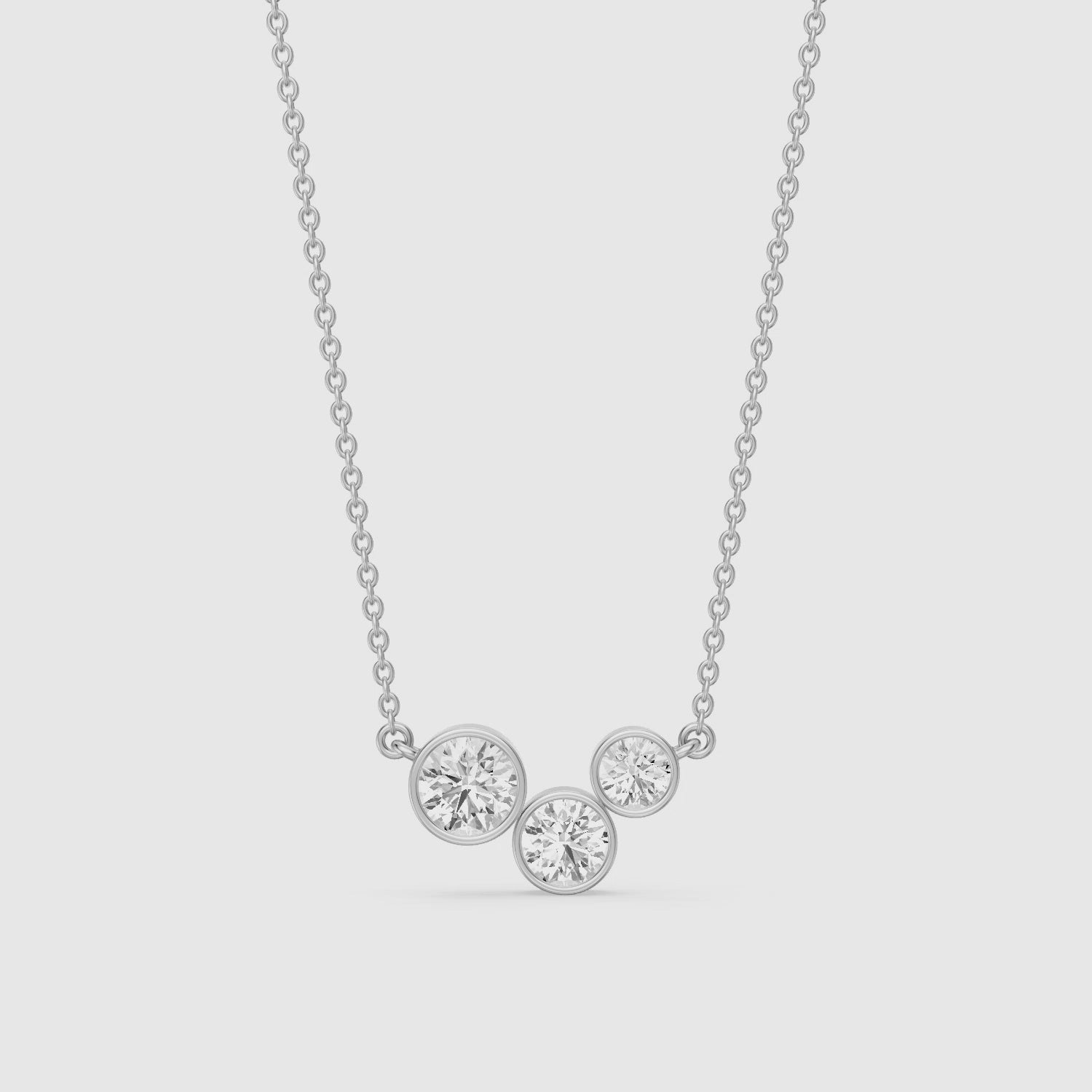Load video: Hoorain Three Stone Round Lab Grown Diamond Bezel Pendant
