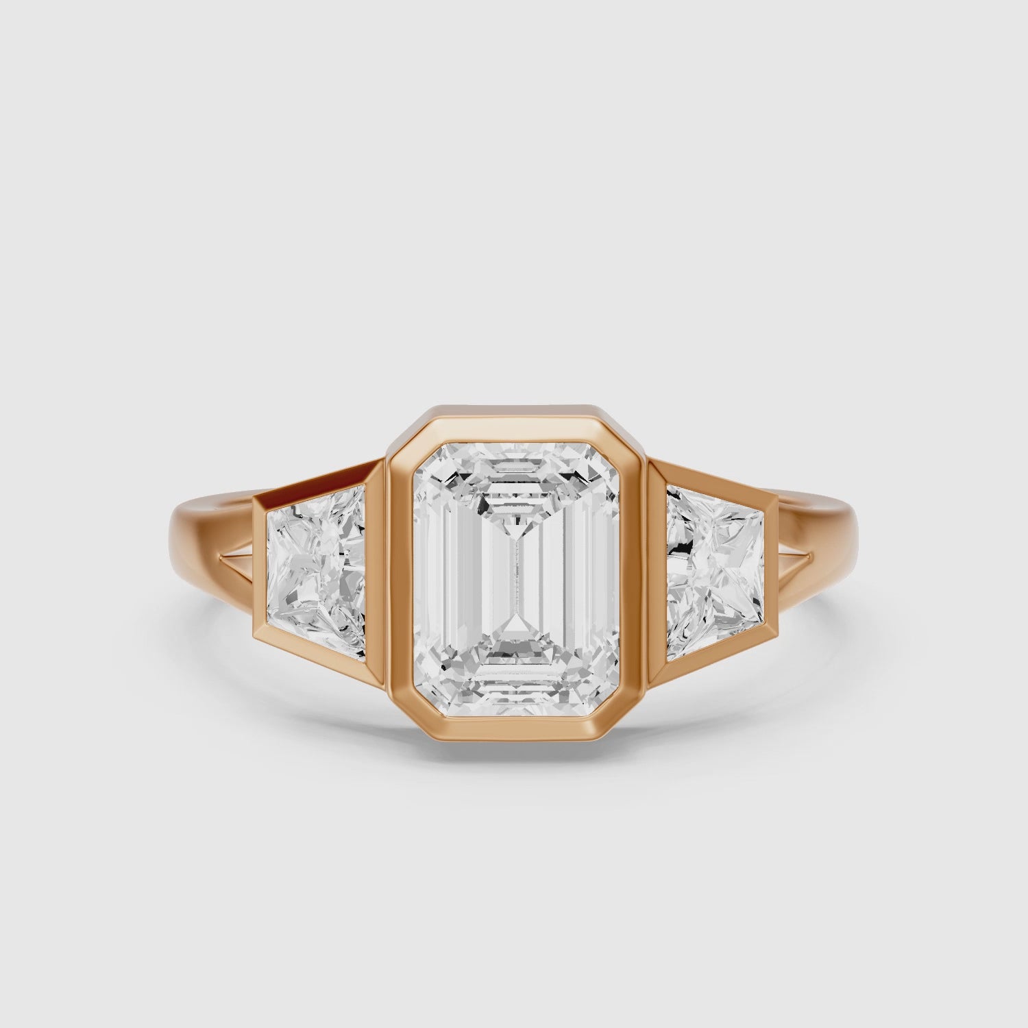 Load video: Stevie Emerald Cut Lab Grown Diamond Bezel Ring with Trapezoid Side Stones
