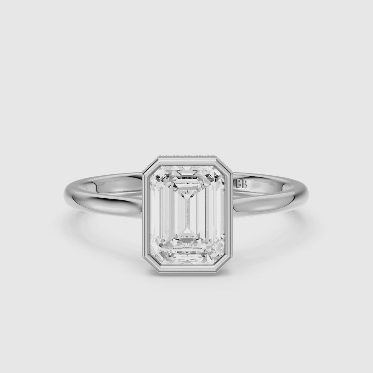 Load video: Anouk Emerald Cut Bezel Lab Grown Diamond Engagement Ring with Hidden Halo
