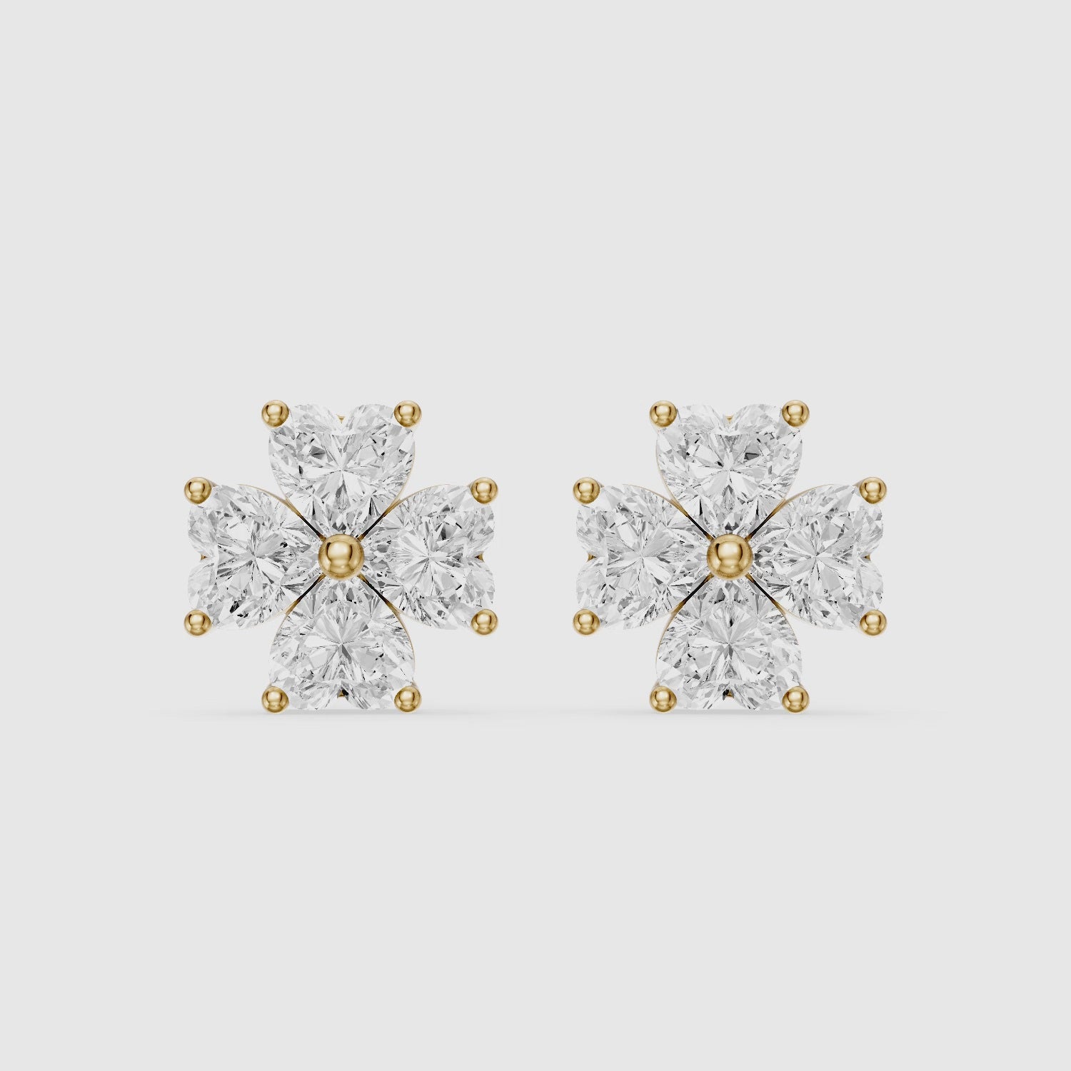 Load video: Eponine Heart Cut Lab Grown Diamond Four Petal Flower Stud Earrings
