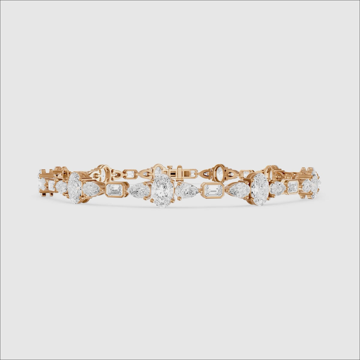 Load video: Remy Pear Oval with Bezeled Emerald Cut Lab Grown Diamond Tennis Bracelet
