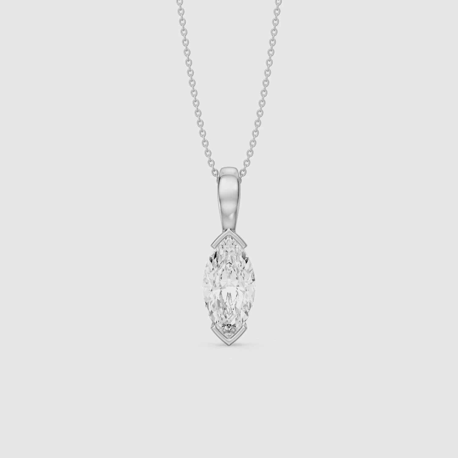 Load video: Ariyah Marquise Half Bezel Lab Grown Diamond Solitaire Pendant