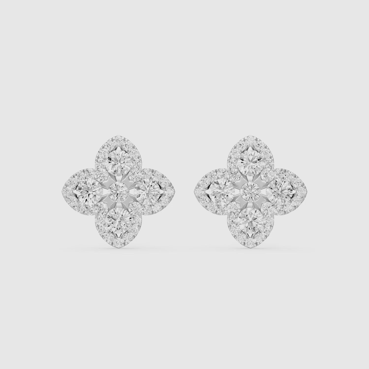 Load video: Nirvana Round Cut Lab Grown Diamond Floral Halo Stud Earrings