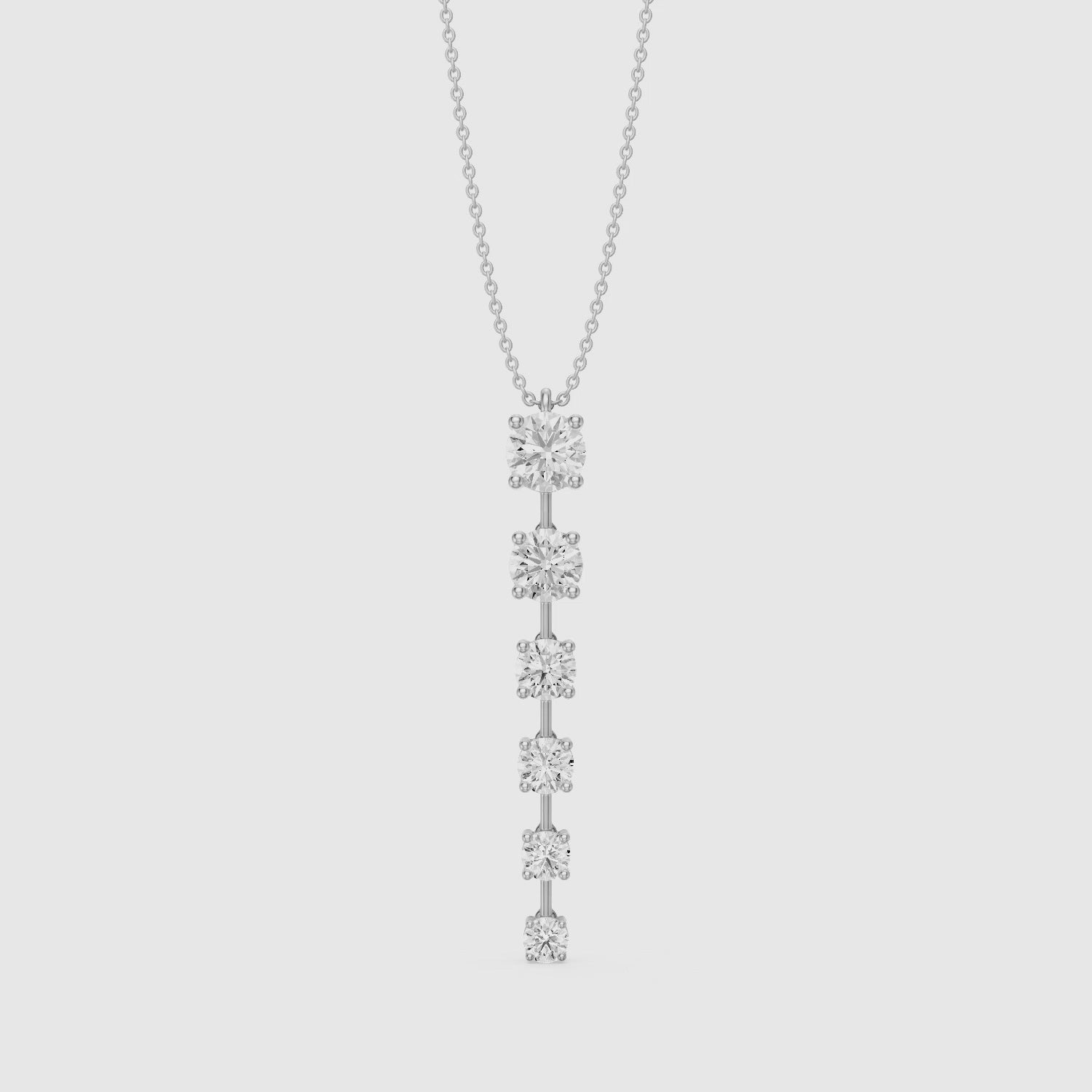 Load video: Delia Graduated Round Lab Grown Diamond Drop Pendant