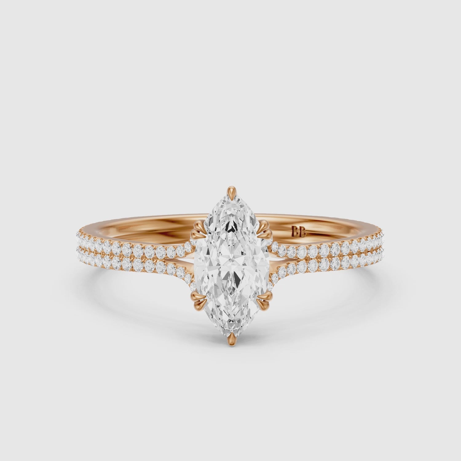Load video: Evie Marquise Lab Grown Diamond Ring with Double Claw Prong and Pave Band